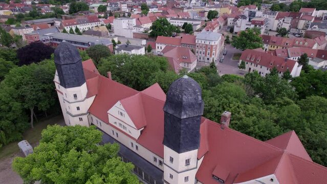 aerial of the 2 towers of K&ouml;then castle in Germany, rotating drone shot