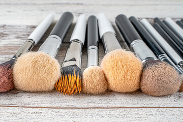 Professional visage brushes for face makeup on table.Close up brush kit