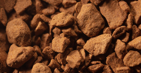 Instant coffee granules as background.