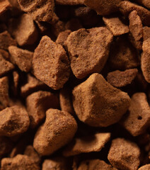 Instant coffee granules as background.