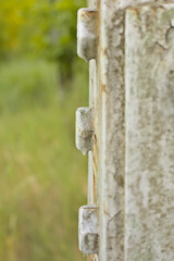Screws on a high voltage pole, side view