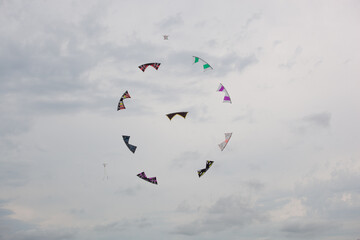 Kite in the sky, Wind Festival Penvins Sarzeau, Fête du Vent. Nine individual kites follow each other in a perfect ballet.