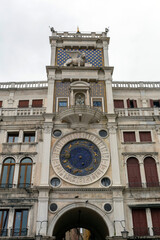 Obraz premium The Clocktower with the archway into the Mercerie leading to the Rialto in Venice