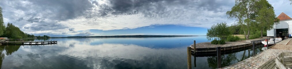 Panoramic  the lake with reflection between water, sky blue and cloud. HD