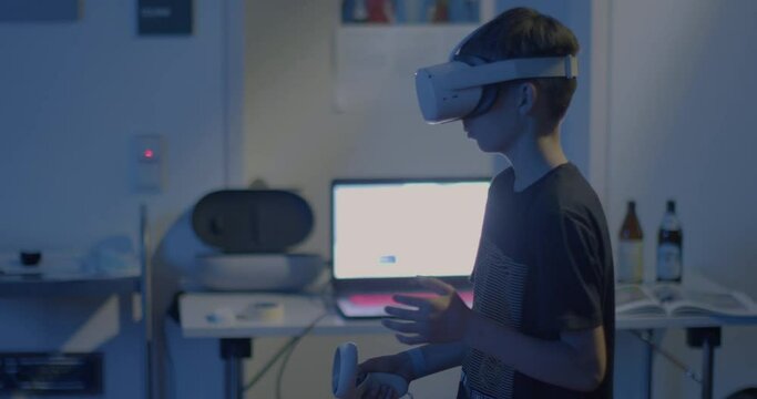 Child tolerate fully immersive 3D virtual reality game play. VR headset is connected to the application on the computer. Introduction to the meta universe. 