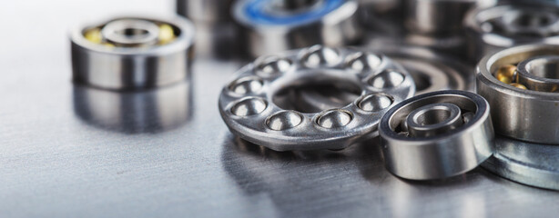 different bearings on a metal background. Part of mechanism.
