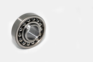 Metal silver ball bearing with balls on white isolated background. Bearing industrial. Part of the car
