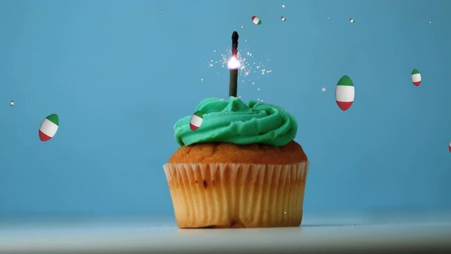 Animation of balls with italian flag over cupcake with firework