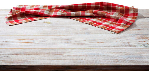 Crumpled linen tablecloth on wooden desk perspective isolated. Selective focus.