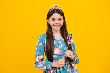 Teenage child girl princess on yellow background. Romantic wonderland story. Little fairy girl with...