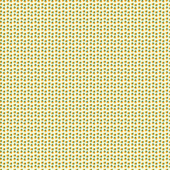 Lemon on a branch with green leaves