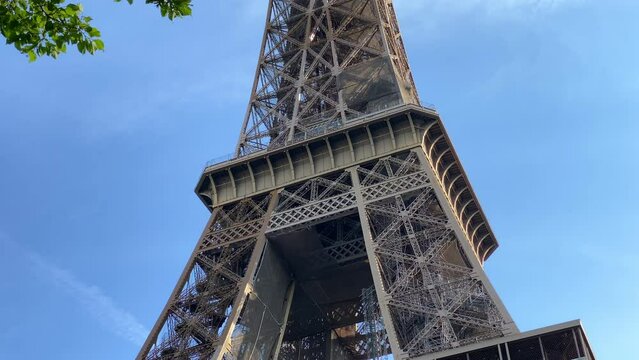 Close up of the Eiffel Tower  on a spring day with blue sky in Paris, France