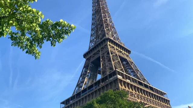 Close up of the Eiffel Tower  on a spring day with blue sky in Paris, France