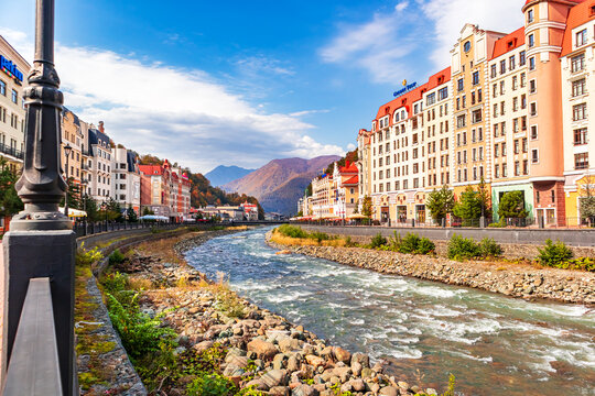 Colorful houses on the embankment in the Rosa Khutor resort.