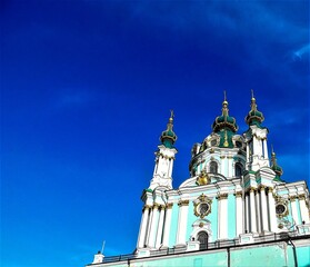 Fototapeta na wymiar View of St. Andrew's Church from St. Andrew's Descent in Kyiv, Ukraine