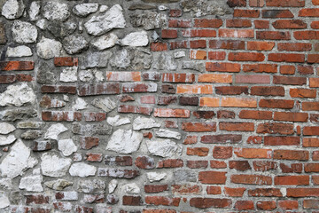Brick and stone wall - rough background.