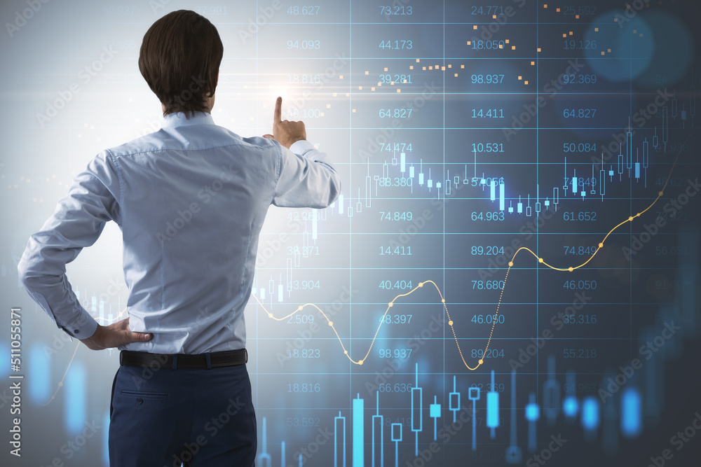 Poster Business strategy, stock market analyzing and investment concept with back view of trader in white shirt touching virtual digital wall with financial indicators and data