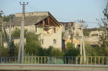 War in Ukraine. Destroyed buildings in Kyiv region after russian army attack. Consequences of russian invasion in Ukraine.  