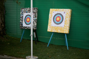 target for shooting from a crossbow, close-up. Close-up of archery paper with holes.