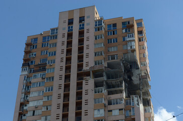 War in Ukraine. Destroyed building in Kyiv after russian missile attack. Consequences of russian invasion in Ukraine. 