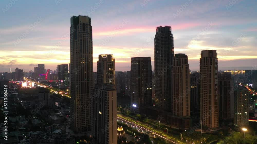 Wall mural Haikou City Aerial View along the Guoxing Avenue CBD Area of Dayingshan District, Urban Night Scenery of Hainan Province, the Largest Free Trade Zone in China.