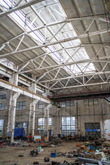 An abandoned steel frame structure automobile production workshop