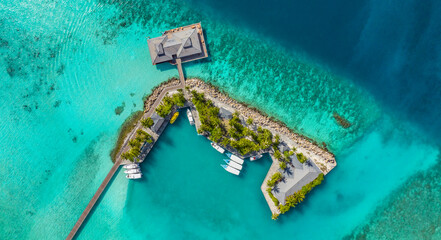 Island and Beach of the Maldives. Tourism, travel and vacation in a luxury resort