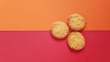 shapes of cookies in stack on red background