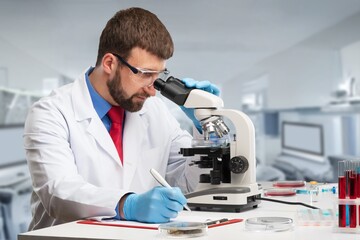 Doctor virologist in gloves and lab coat working