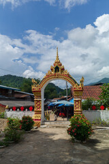 Naklejka premium Small Buddhism Temple in urban village near Tham Ting Cave in Luang Prabang, Laos