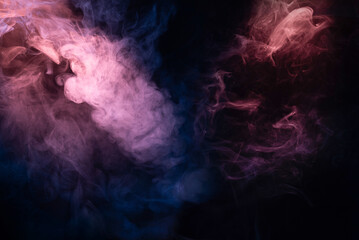 Blue and pink steam on a black background.