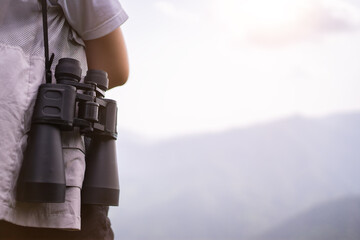 trekking concept, Hiking women use binoculars to travel