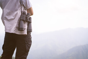 trekking concept, Hiking women use binoculars to travel