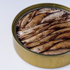 canned sprats in oil on a white background
