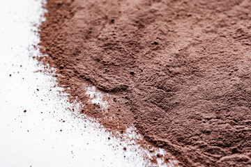 chocolate cocoa milk powder on a white background