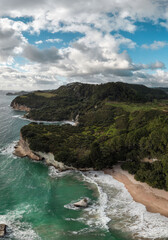 Cathedral Cove aerial view located in Coromandel Peninsula. New Zealand. Vertical