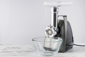 electric meat grinder on a white background