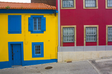 Colorful buildings near canal in Old Town of Aveiro, Portugal