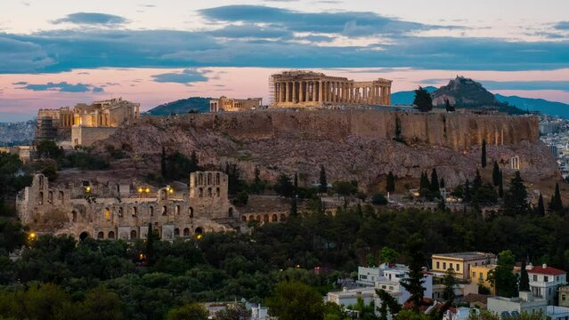Athens, Greece. Aerial view of Athens, Greece during the sunset. Famous Parthenon illuminated in the evening, Colorful sunset sky