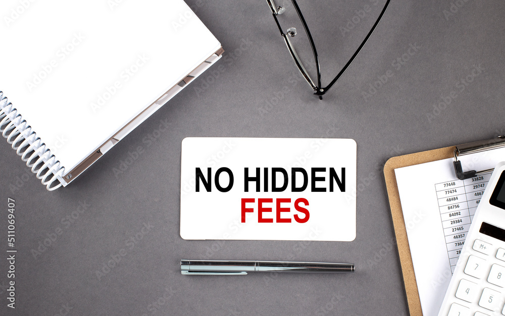 Aufkleber no hidden fees text written on the card with notebook and clipboard, grey background