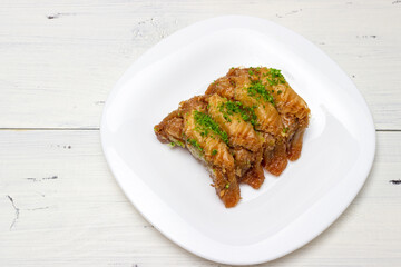 oriental sweets on a white table on a white plate
