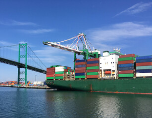 Loaded container ship in a harbor