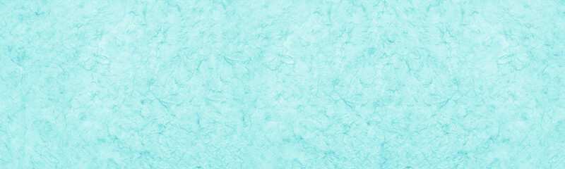 Pastel blue textured wallpaper. Rough paper wide texture. Light teal color panoramic abstract background