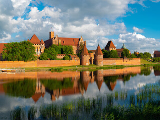 Fototapeta na wymiar 2022-06-13. Castle of the Teutonic Knights Order in Malbork, Poland, is the largest castle in the world.