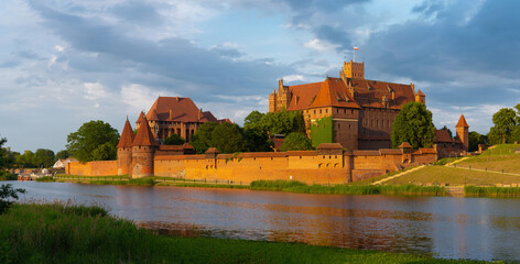 Naklejka na ściany i meble 2022-06-13. Castle of the Teutonic Knights Order in Malbork, Poland, is the largest castle in the world.
