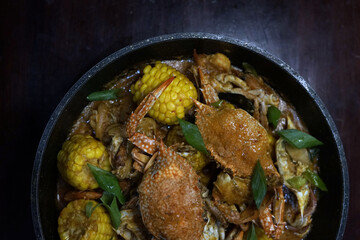 Spicy crab with sauce and corn