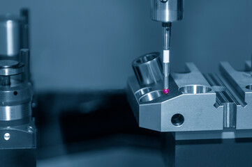 The  touching probe  measuring the sample CNC machine.