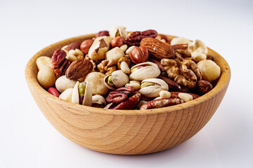 set of different nuts on a white acrylic background