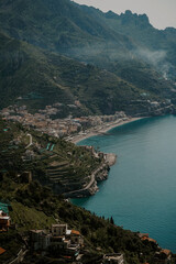 Beautiful panoramic aerial views of Ravello in Amalfi Coast, Campania, Italy. The view of green emerald hills, water, coastline, seaside, mountain roads and towns