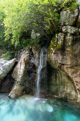 Water dripping down the rocks into the soca river
